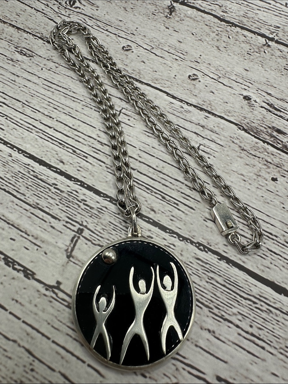 Taxco Silver Black Enamel Pendant with Stylized Figures